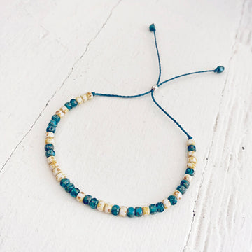 beach side // turquoise blue and white beaded cord bracelet