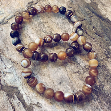 stability  brown line agate and natural brass mala bead bracelet