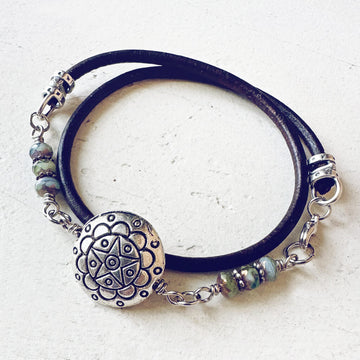 star mandala // silver plated puffed coin & glass bead leather wrap bracelet