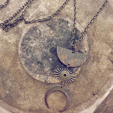 umbra // antiqued half moon, sunburst & crescent moon boho brass necklace